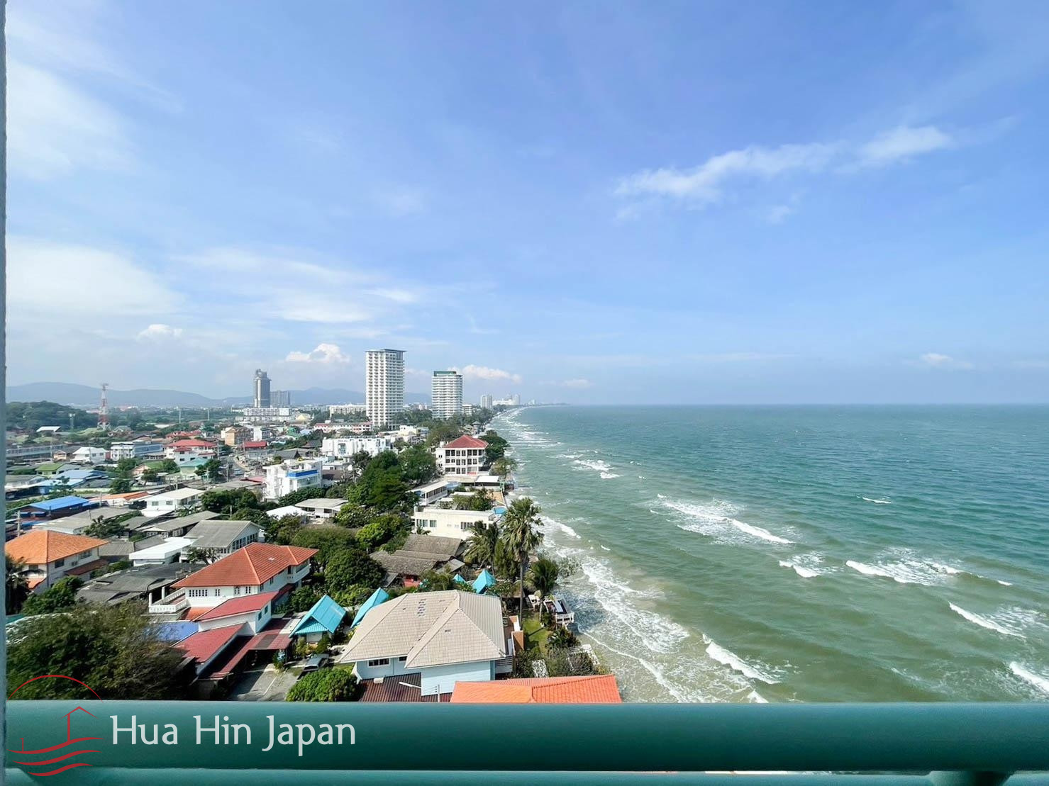 Aerial coastal view of Hua Hin with ocean and beachfront buildings
