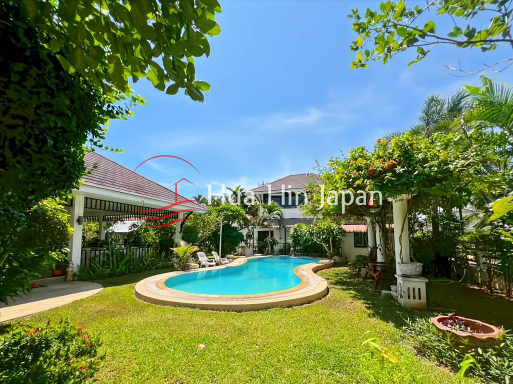 5 Bed 4 Bath Garden Estate swimming pool area and garden