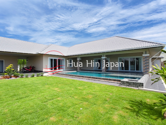 Modern pool villa with landscaped garden
