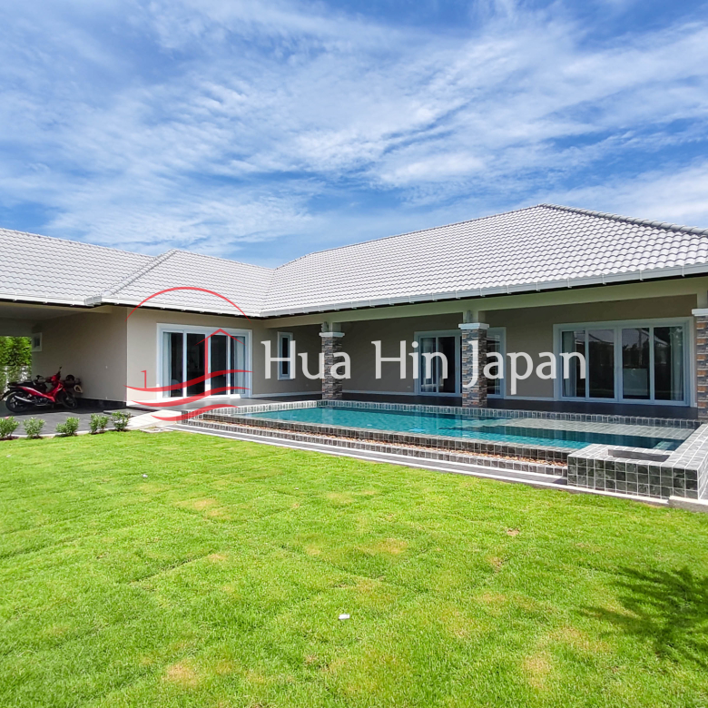 Modern pool villa with landscaped garden